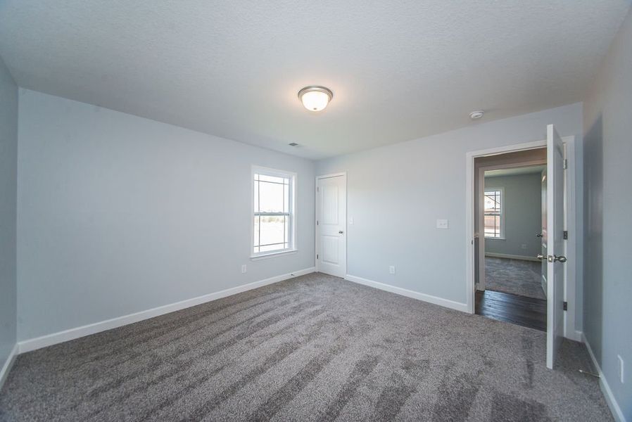 Representative unfurnished interior of a home built from the Franklin by Enchanted Homes in Guadalupe Heights, Seguin (Image 45).