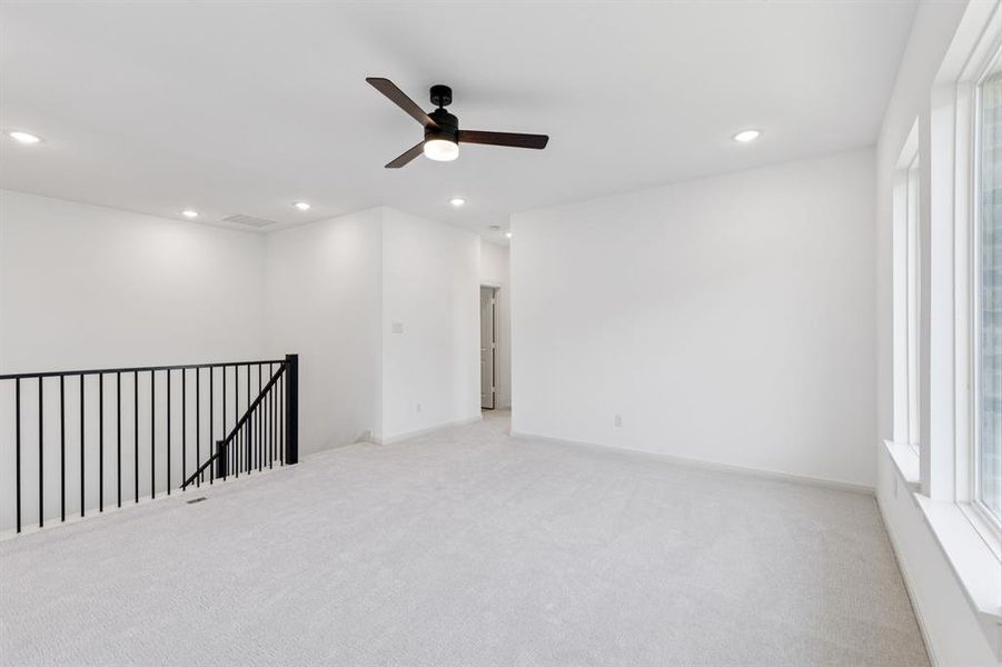 Plenty of family fun to be shared in this wonderful, light filled game room!