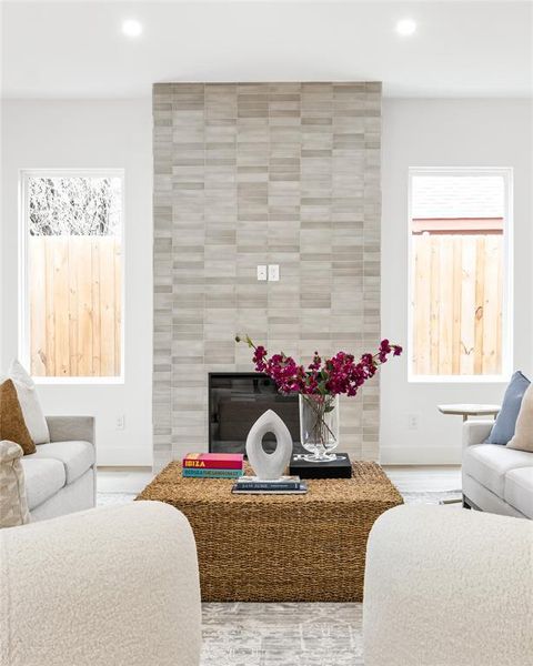 Living room featuring tile walls