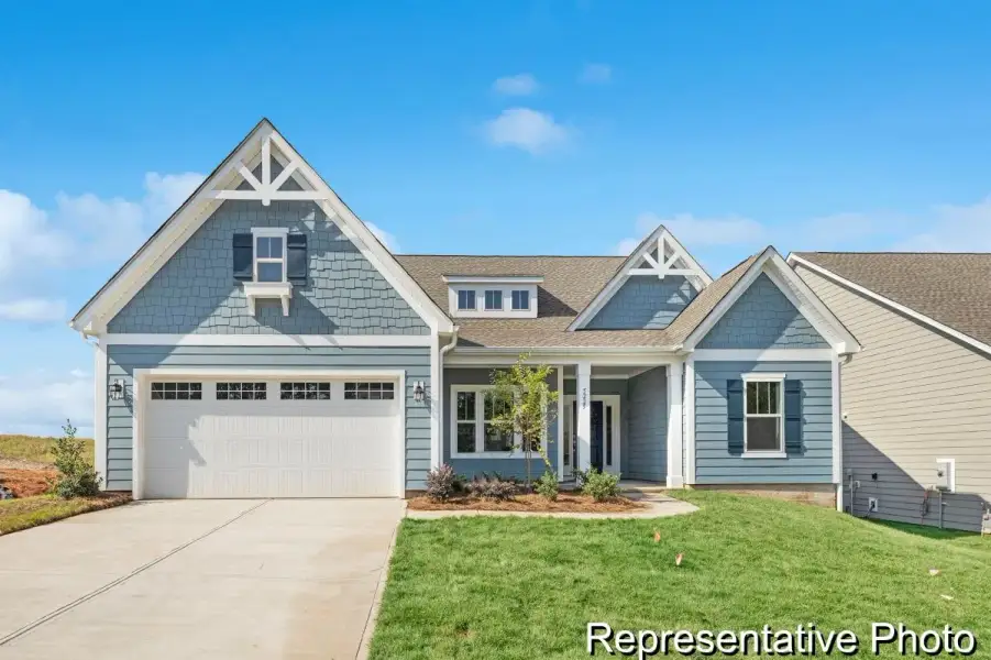 Front exterior of a new home in Huntington Hills, Lincolnton, NC, highlighting curb appeal (Image 1). Front exterior of a new home in Huntington Hills, Lincolnton, NC, highlighting curb appeal (Image 1).