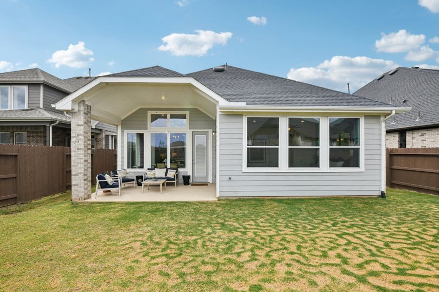 Exterior details and patio area of a home in Wood Leaf Reserve, Tomball (Image 26).