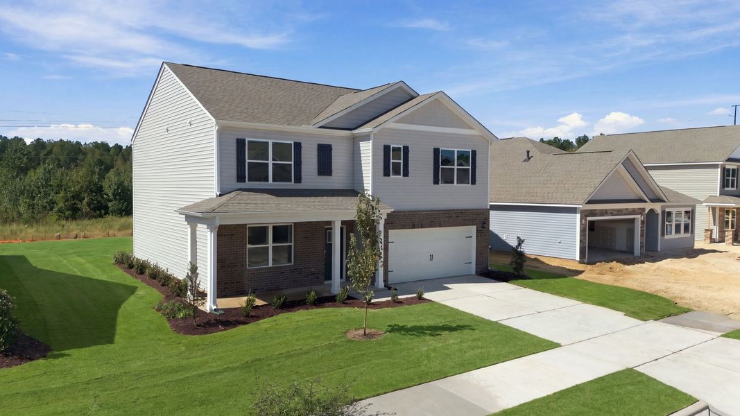 Front exterior of a new home in West New Bern, New Bern, NC, highlighting curb appeal (Image 17). Front exterior of a new home in West New Bern, New Bern, NC, highlighting curb appeal (Image 17).