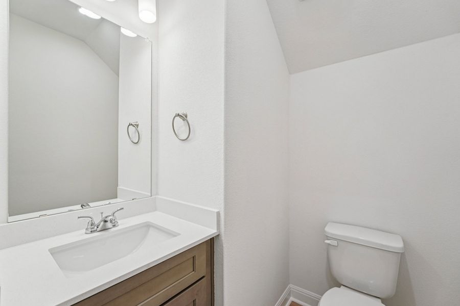 Furnished interior view inside a new home in Sage Hollow, Kyle (Image 9).