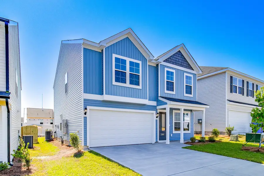 Front exterior of a new home in Ellington, Elgin, SC, highlighting curb appeal (Image 2). Front exterior of a new home in Ellington, Elgin, SC, highlighting curb appeal (Image 2).
