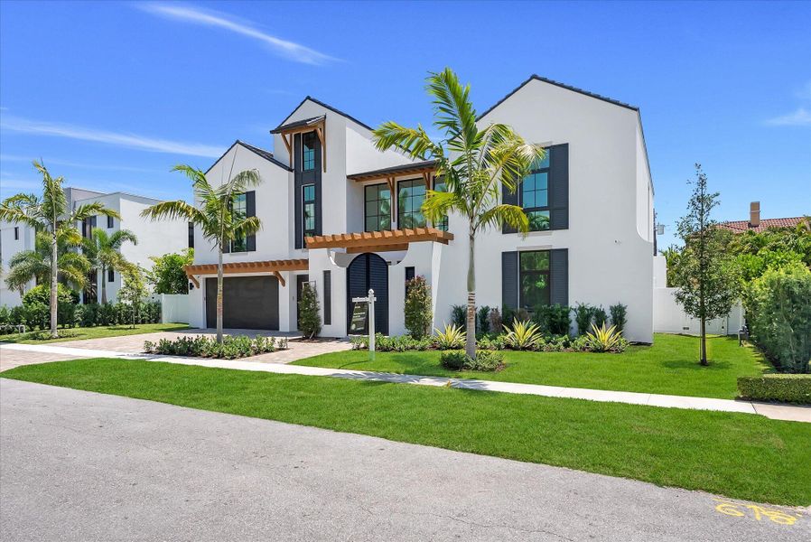 Front exterior of a new home in , Boca Raton, FL, highlighting curb appeal (Image 34). Front exterior of a new home in , Boca Raton, FL, highlighting curb appeal (Image 34).