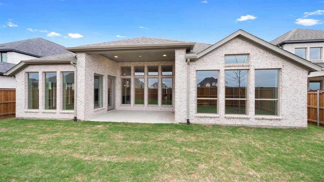 Exterior details and patio area of a home in Cambridge Crossing, Celina (Image 3).