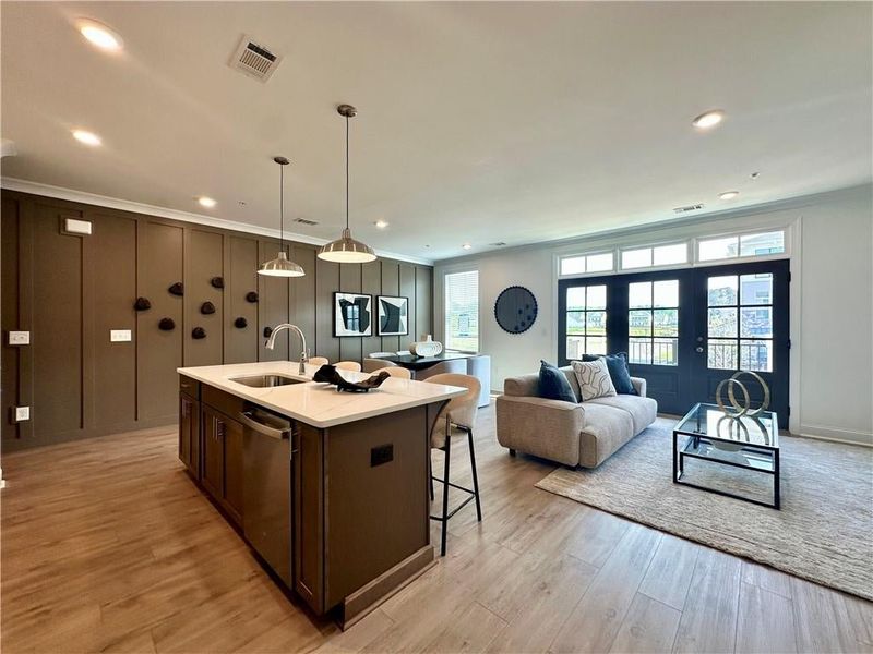 Open Concept Main Level with 9 ft ceilings *Photos Showcase Warm Wheat Design Collection from a different Staged Model Home Site*