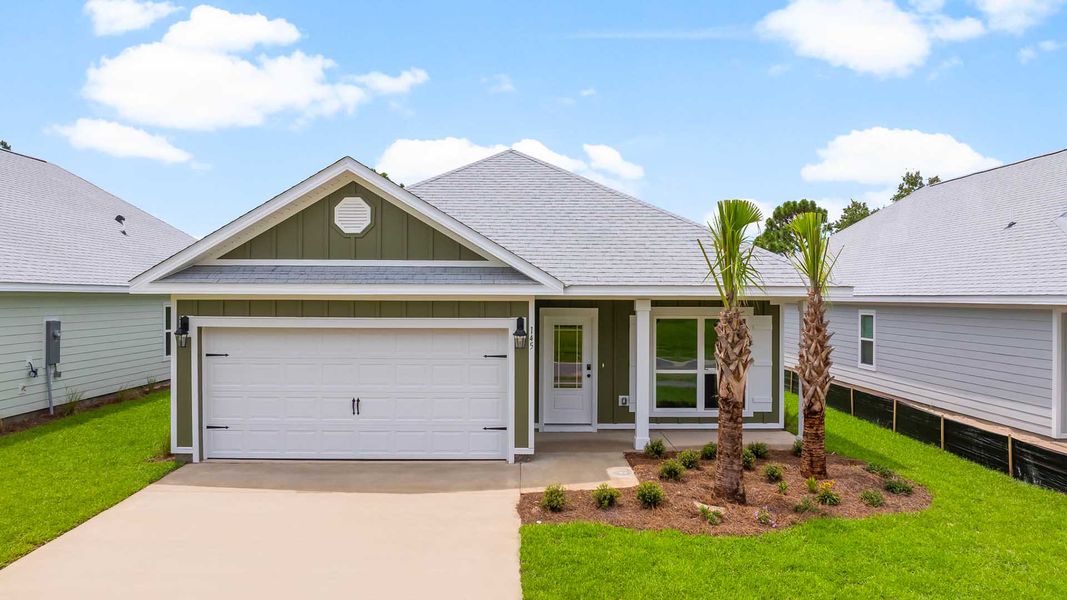 Front exterior of a new home in Caballeros Estates At Hombre, Panama City Beach, FL, highlighting curb appeal (Image 1). Front exterior of a new home in Caballeros Estates At Hombre, Panama City Beach, FL, highlighting curb appeal (Image 1).