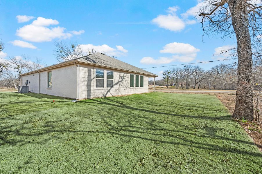 Exterior details and patio area of a home in Runaway Bay, Runaway Bay (Image 21).