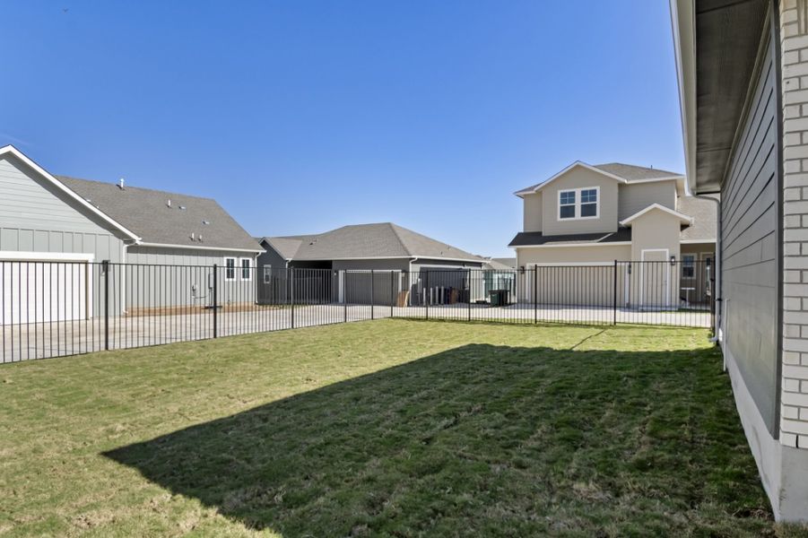 Exterior details and patio area of a home in Easton Park, Austin (Image 33).