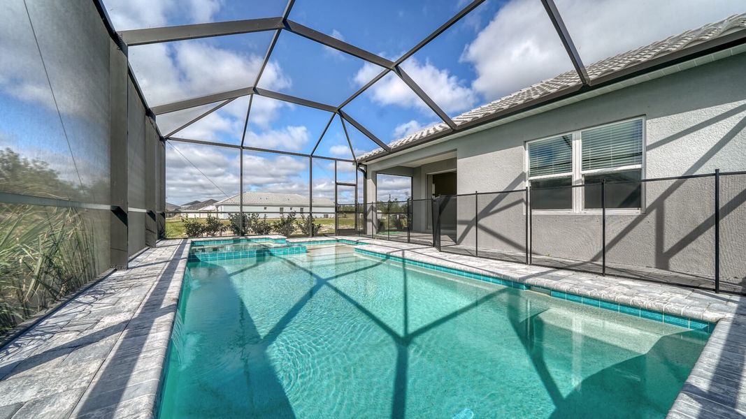 Exterior details and patio area of a home in Windward, Sarasota (Image 17).