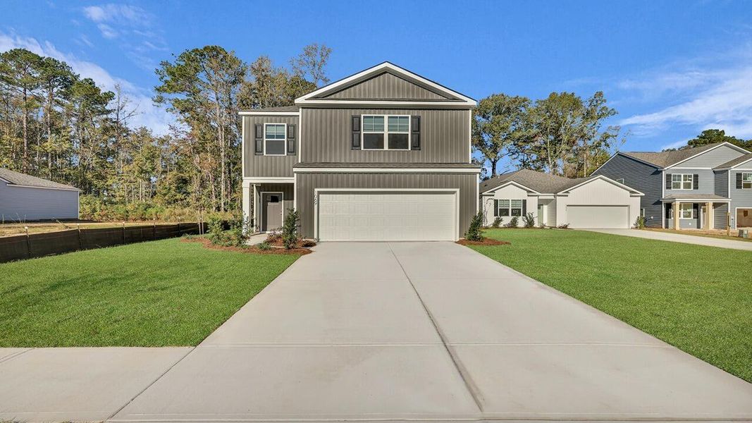 Front exterior of a new home in , Moncks Corner, SC, highlighting curb appeal (Image 2). Front exterior of a new home in , Moncks Corner, SC, highlighting curb appeal (Image 2).