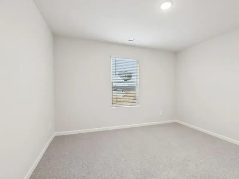 Spacious, unfurnished interior of a new home in Country Lane - Signature Series, Clayton (Image 18).