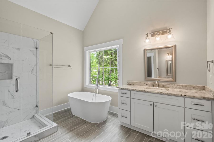 soaking tub, glass shower