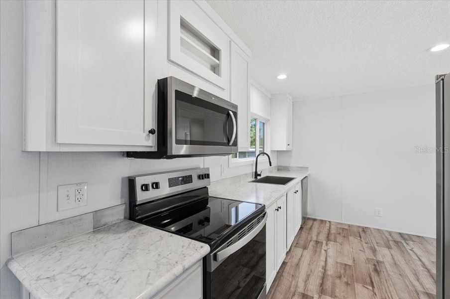 Furnished interior view inside a new home in , Port Richey (Image 5).