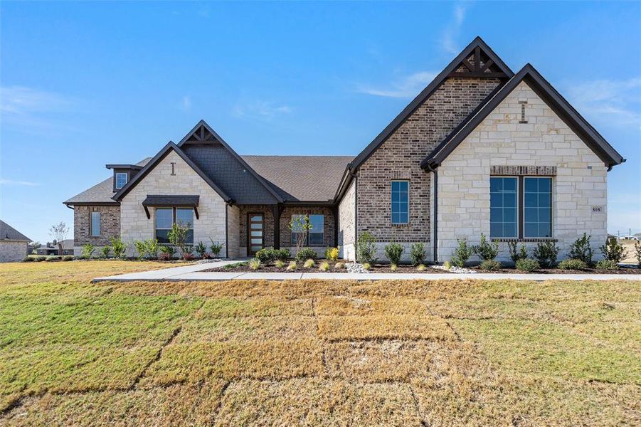 Front exterior of a new home in Creekview Addition, Van Alstyne, TX, highlighting curb appeal (Image 25). Front exterior of a new home in Creekview Addition, Van Alstyne, TX, highlighting curb appeal (Image 25).