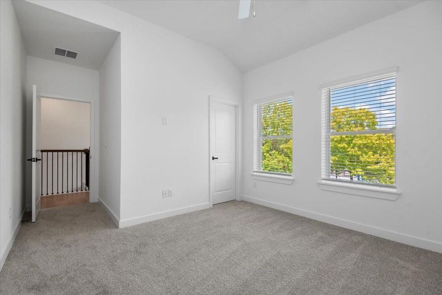Another view of the primary bedroom Another view of the primary bedroom