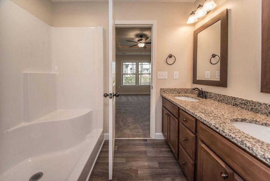 Representative furnished interior of a home built from the Inman by Enchanted Homes in Hampshire Heights, Moore (Image 13).