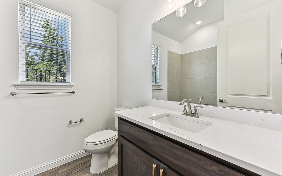 Representative furnished interior of a home built from the Newberry by Brookfield Residential in Traditional at Kissing Tree, San Marcos (Image 5).