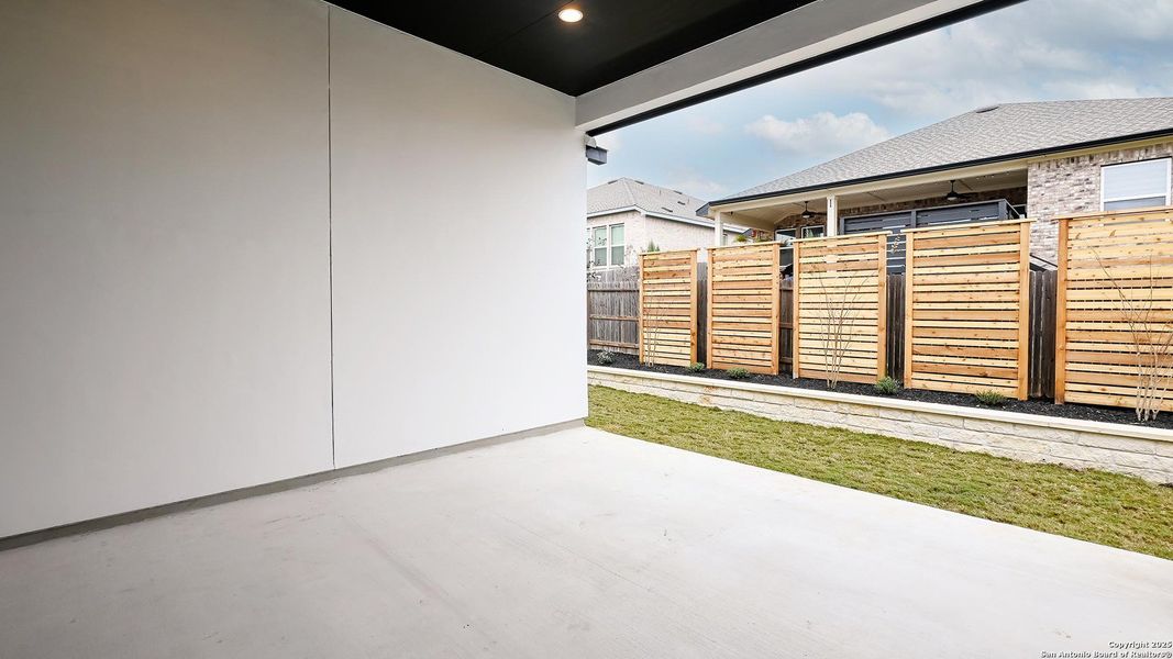 Exterior details and patio area of a home in Veramendi 60', New Braunfels (Image 27).