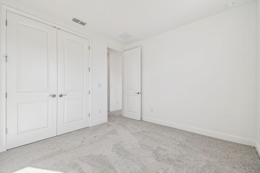Representative unfurnished interior of a home built from the 50 ' - Saratoga by William Ryan Homes in Tamarack at Two Rivers, Zephyrhills (Image 22).