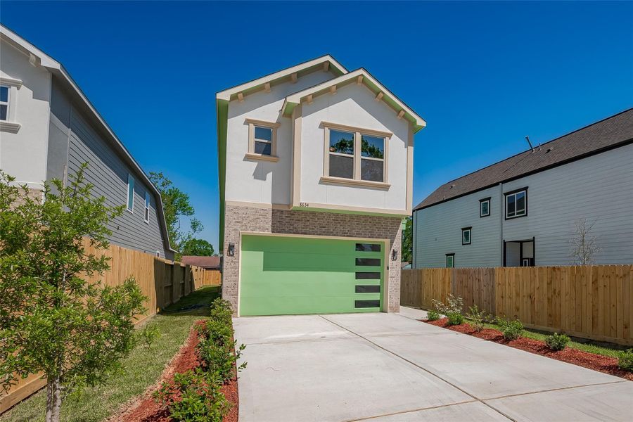 Front exterior of a new home in , Houston, TX, highlighting curb appeal (Image 17). Front exterior of a new home in , Houston, TX, highlighting curb appeal (Image 17).