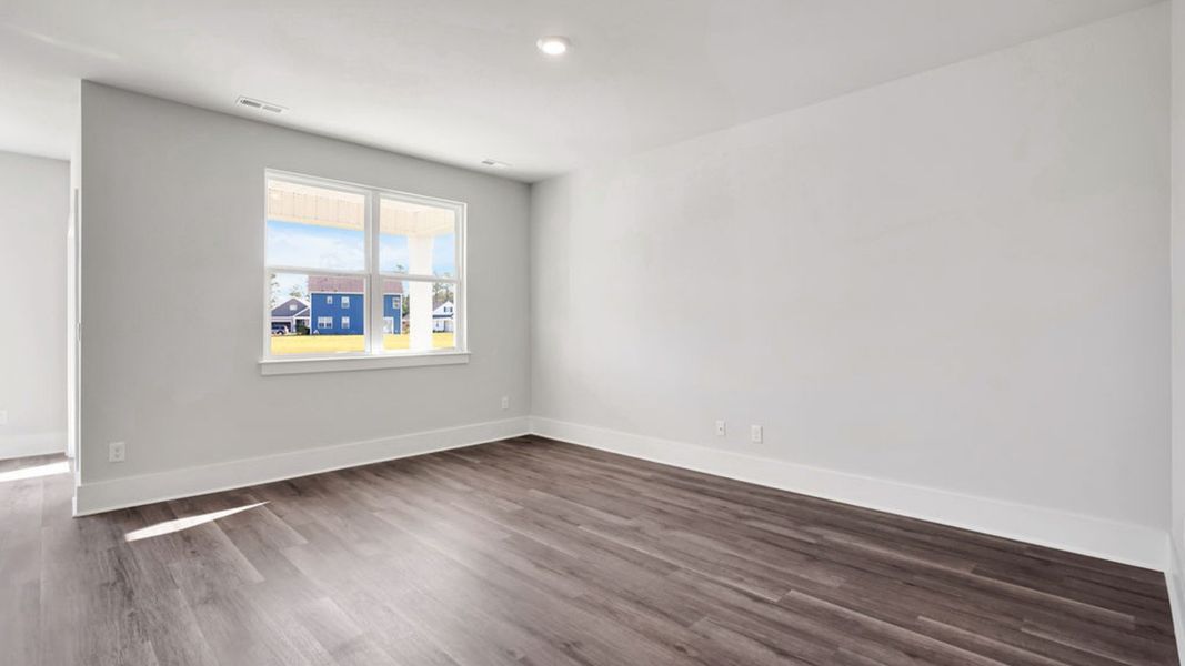 Representative unfurnished interior of a home built from the ACADIA by D.R. Horton in Rolling Hills, Bolivia (Image 25).