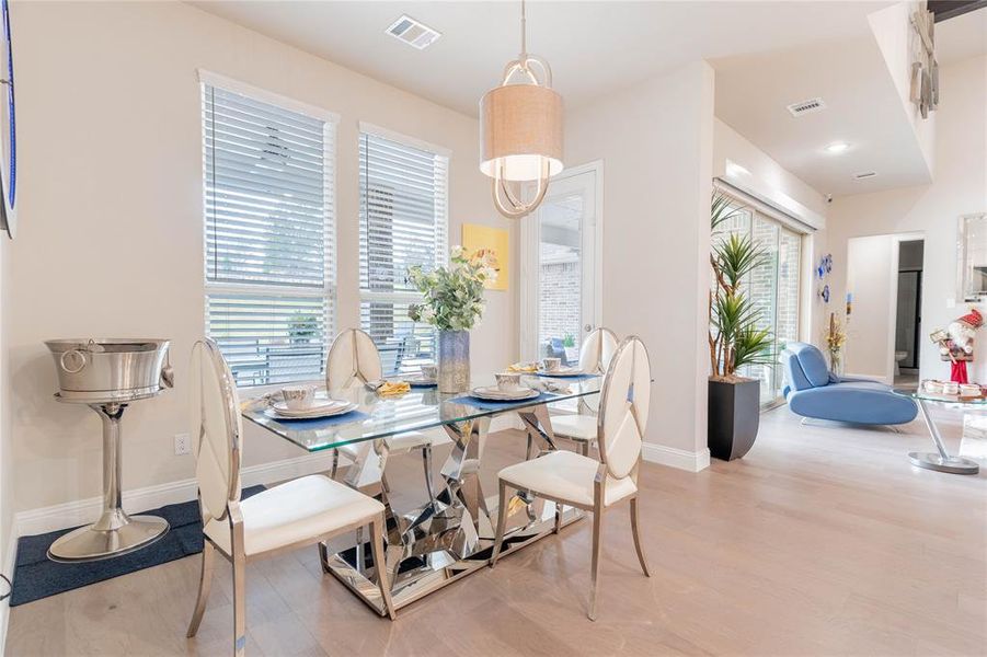Dining room featuring light wood-style flooring
