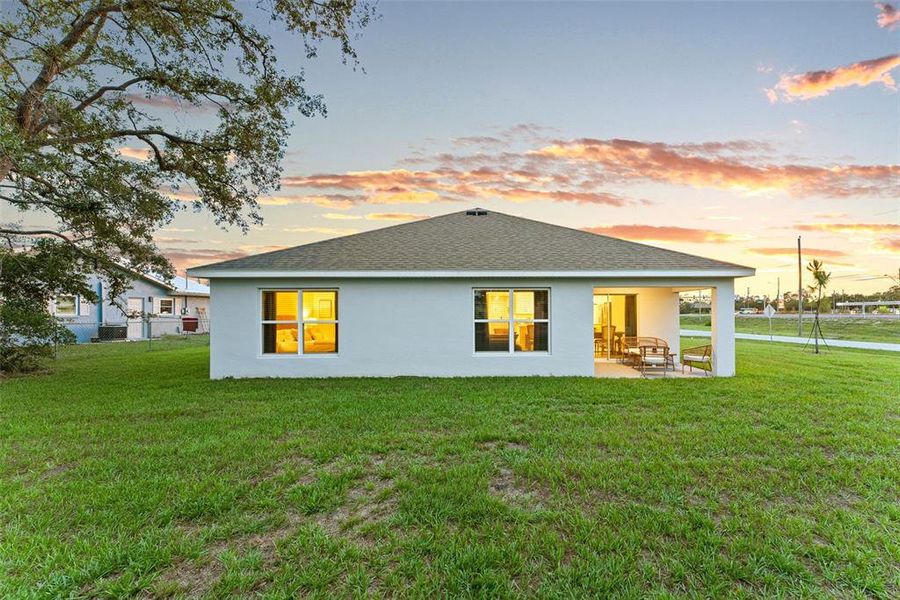 Front exterior of a new home in , Spring Hill, FL, highlighting curb appeal (Image 2).