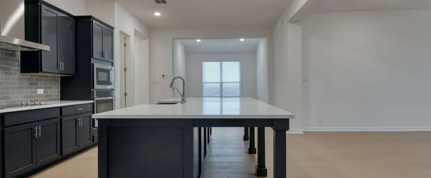 Representative furnished interior of a home built from the Blanco by Ashton Woods in Saddlebrook Ranch, Schertz (Image 9).