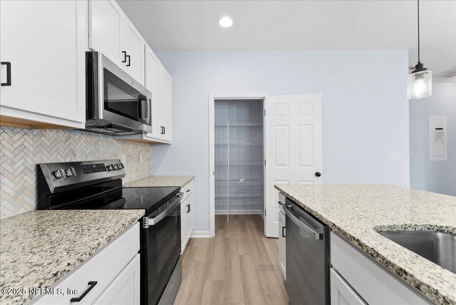 Furnished interior view inside a new home in , East Palatka (Image 10). Furnished interior view inside a new home in , East Palatka (Image 10).