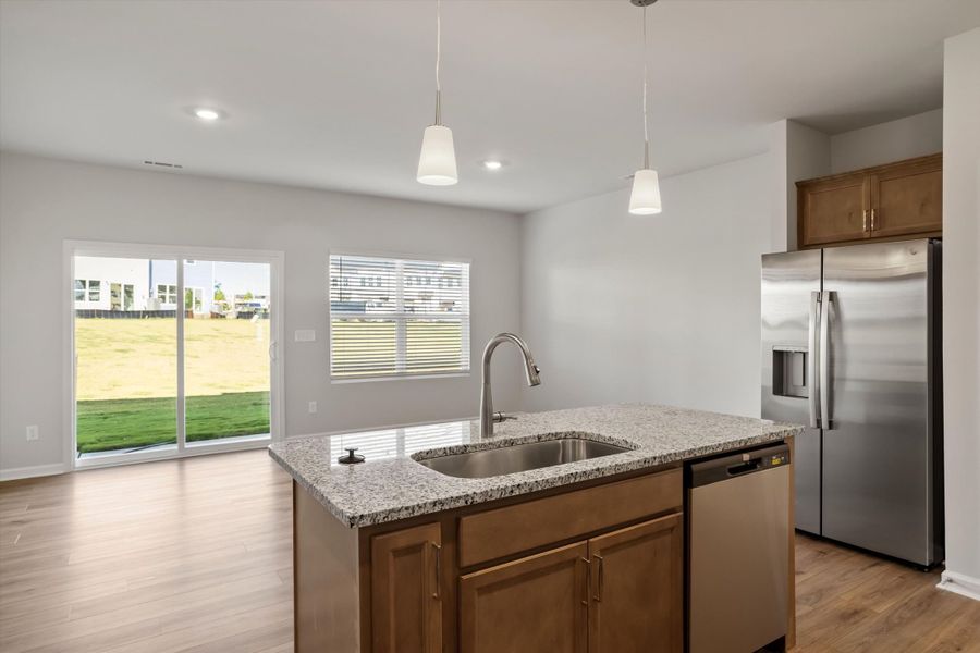 Furnished interior view inside a new home in West Main Townhomes, Sanford (Image 9).