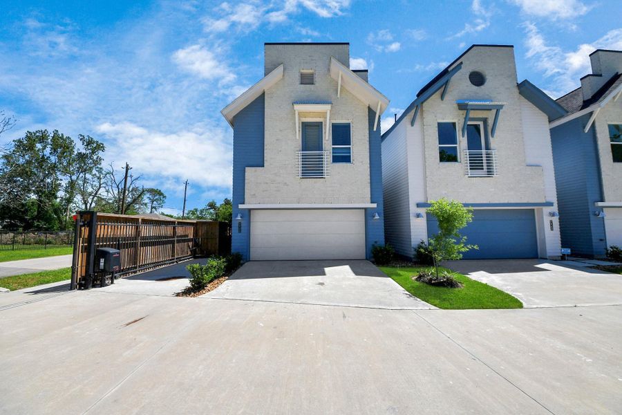 Modern home featuring a 2 car garage providing secure parking. Modern home featuring a 2 car garage providing secure parking.