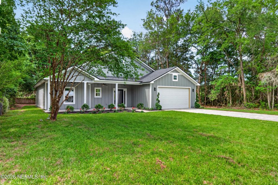 Front exterior of a new home in , Macclenny, FL, highlighting curb appeal (Image 27).