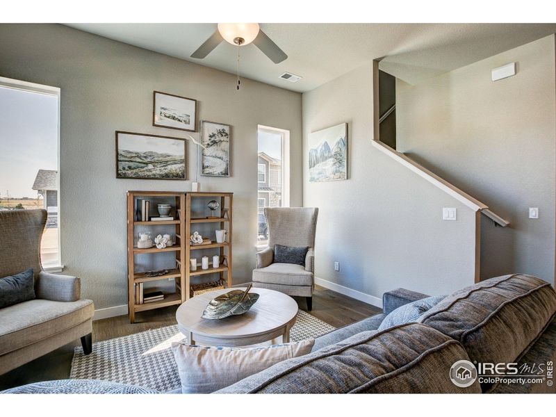 Gorgeous, bright open living space! Photos of a previously built model.