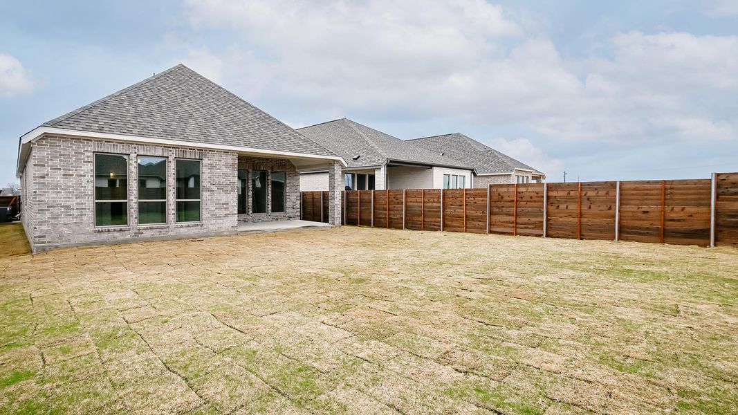 Exterior details and patio area of a home in Juniper Springs, Lockhart (Image 29).