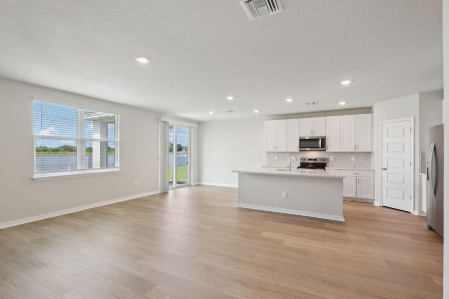 Furnished interior view inside a new home in Hampton Park - Classic Series, Vero Beach (Image 17).