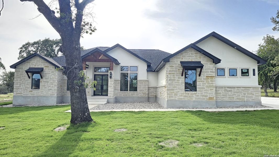 Front exterior of a new home in , Adkins, TX, highlighting curb appeal (Image 32). Front exterior of a new home in , Adkins, TX, highlighting curb appeal (Image 32).