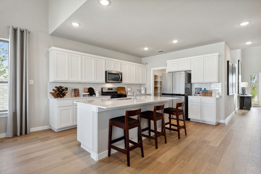 Kitchen in the Winters home plan by Trophy Signature Homes