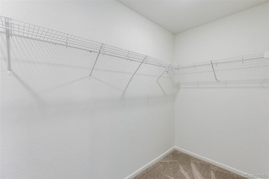 Spacious, unfurnished interior of a new home in Terrain Oak Valley, Castle Rock (Image 37).