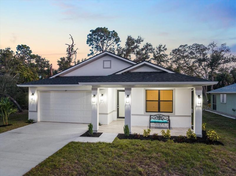 Front exterior of a new home in , Rotonda West, FL, highlighting curb appeal (Image 2).