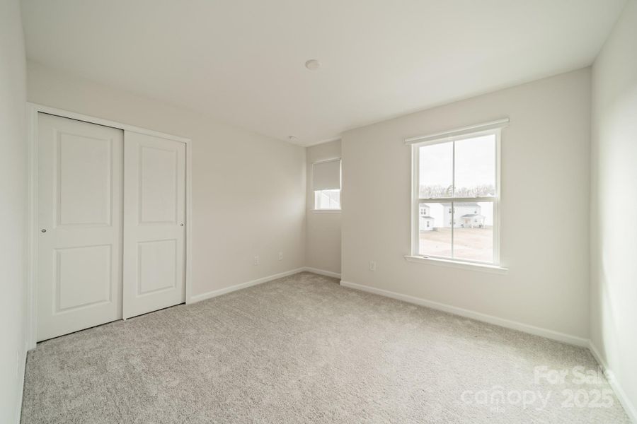 Spacious, unfurnished interior of a new home in Stewarts Landing, Charlotte (Image 39).