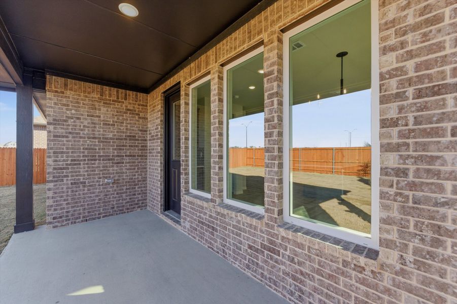 Exterior details and patio area of a home in Morningstar, Aledo (Image 4).
