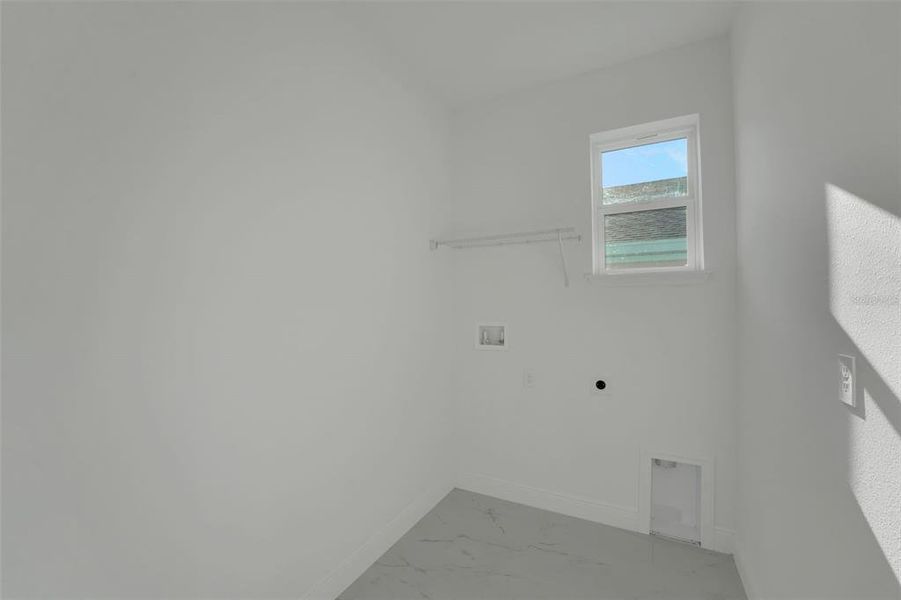 Spacious, unfurnished interior of a new home in Green Key Village, Lady Lake (Image 21).