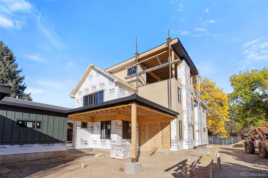 covered back patio, large 4 panel sliding door to be installed.