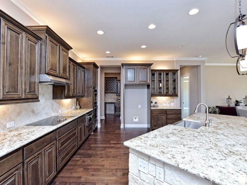 Representative furnished interior of a home built from the San Simeon I by Giddens Homes in Clearwater Ranch, Liberty Hill (Image 259).