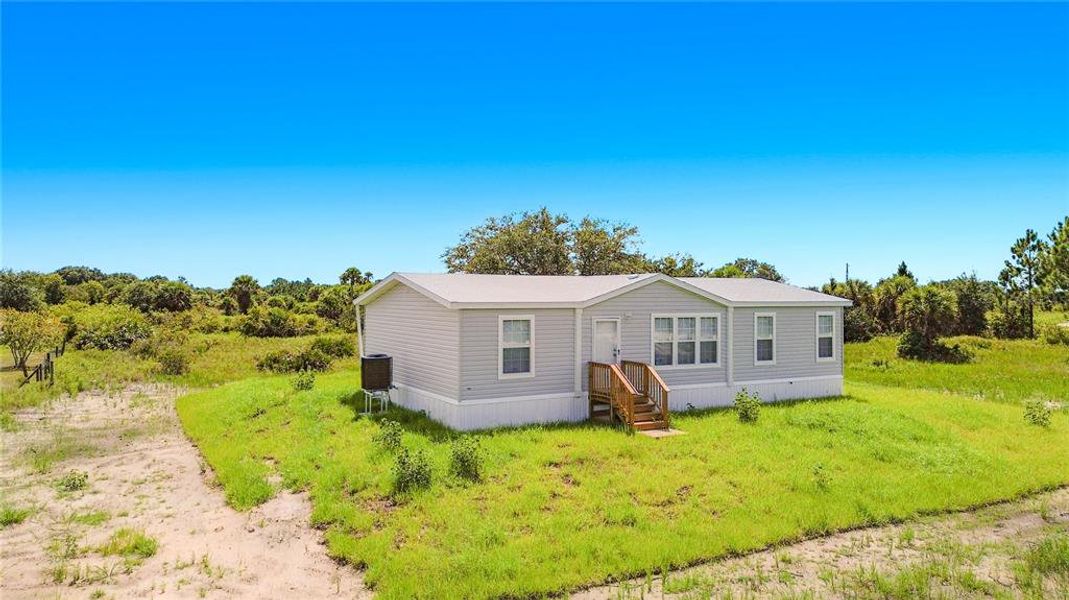 Exterior details and patio area of a home in , Okeechobee (Image 18). Exterior details and patio area of a home in , Okeechobee (Image 18).