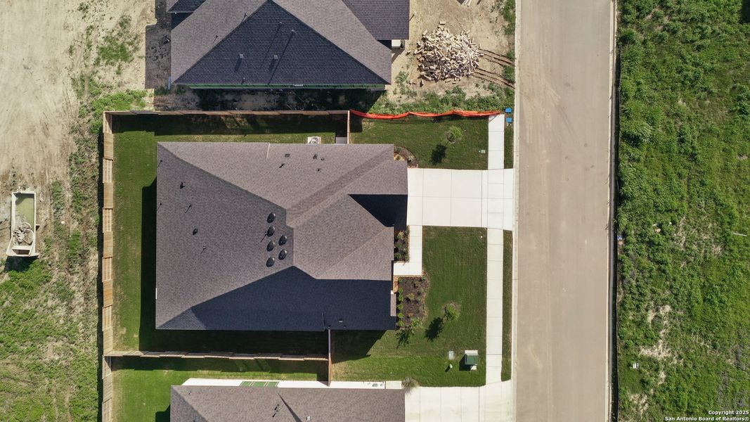 Front exterior of a new home in Mesa Western, Cibolo, TX, highlighting curb appeal (Image 20).
