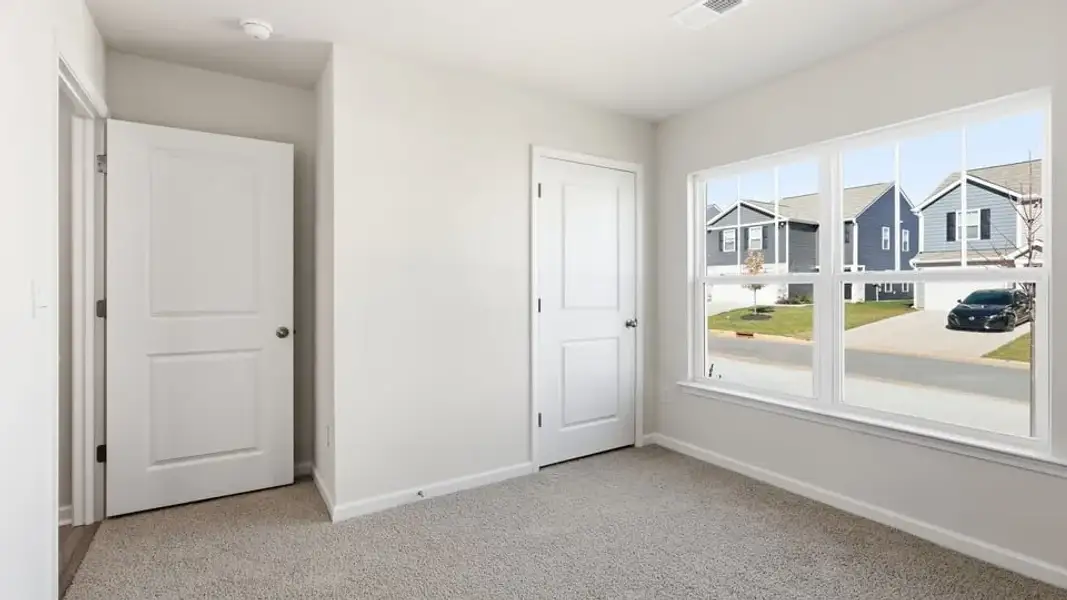 Spacious, unfurnished interior of a new home in Waverly Station, Greenwood (Image 17).
