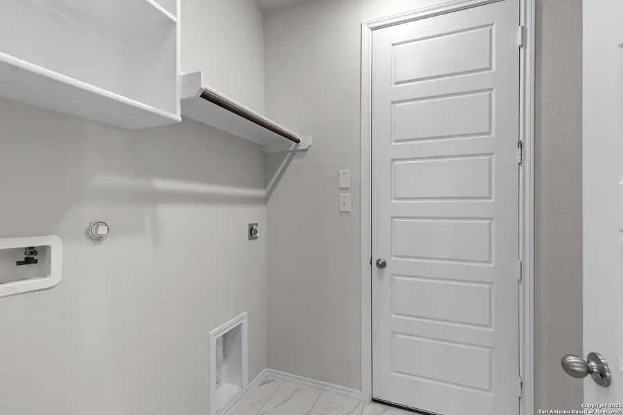 Furnished interior view inside a new home in Megan's Landing, Castroville (Image 4).